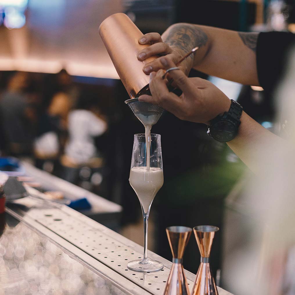 Person Pouring Cocktail